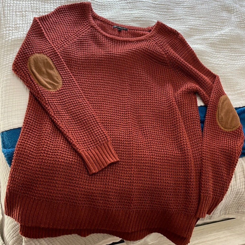 Deep red sweater